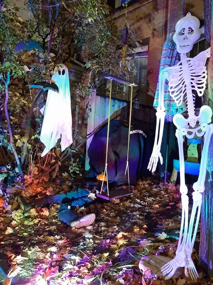 A tall skeleton and ghost decoration on Longboat Avenue