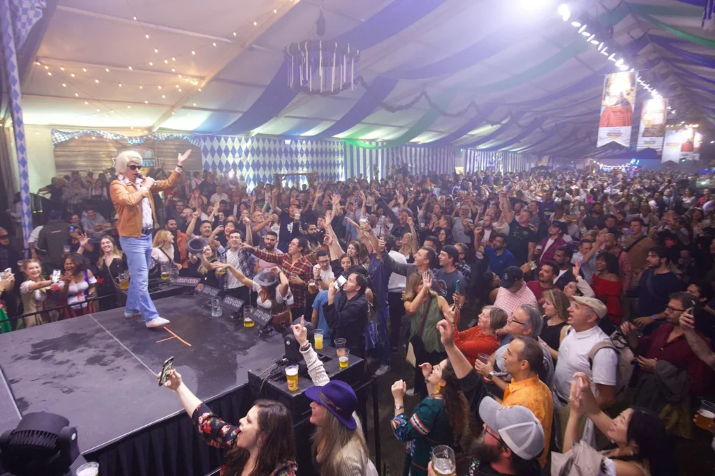 A full tent watching a stage at Toronto Oktoberfest