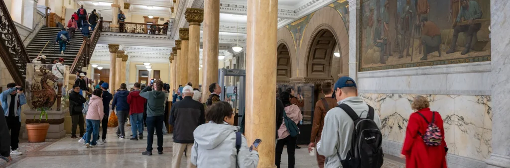 Visitors inside Old City Hall in Toronto