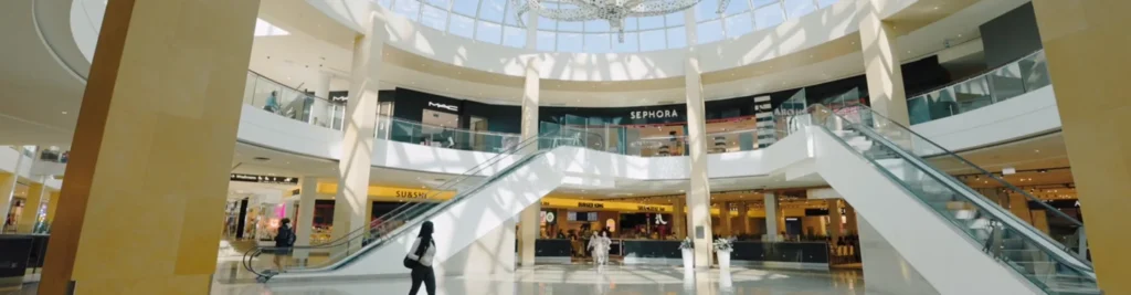 Escalators and shops inside Square One in Mississauga