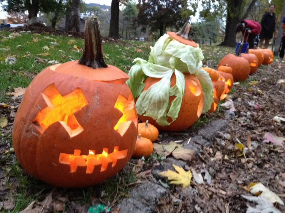 Carved pumpkins and a carved cabbage at Cabbagetown’s Pumpkin Walk