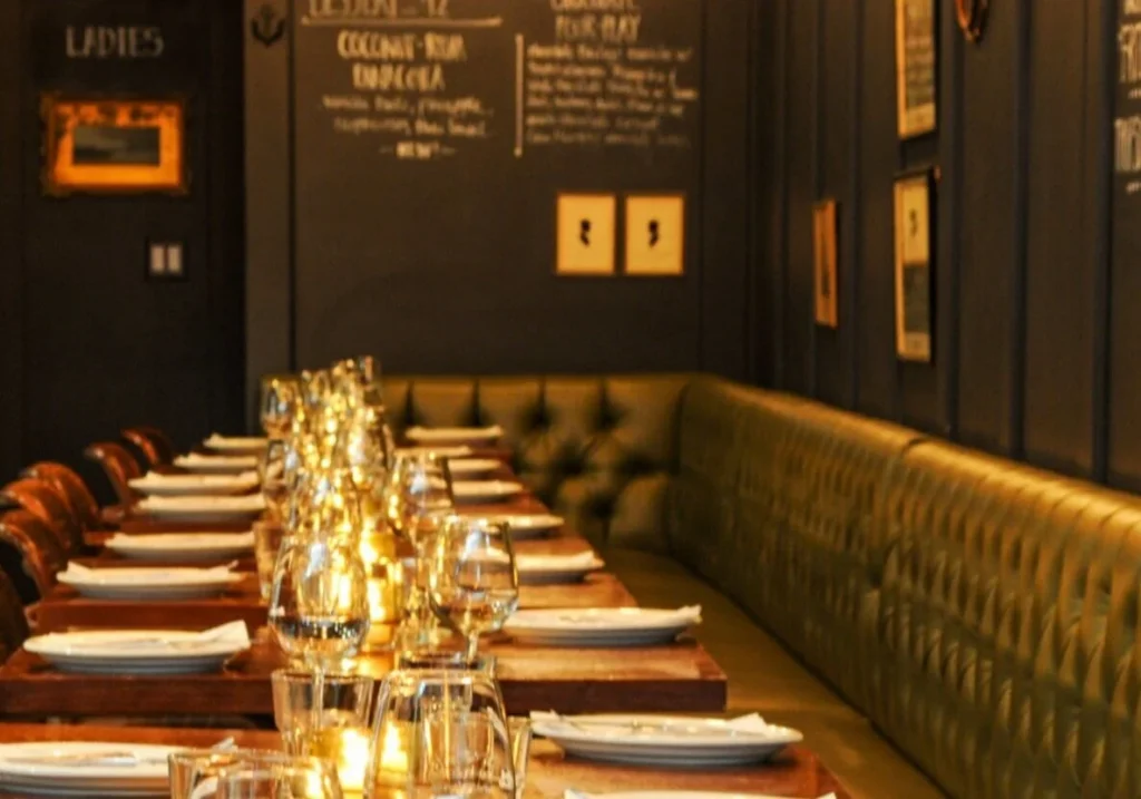 Set tables and booth seating at Eastside Social