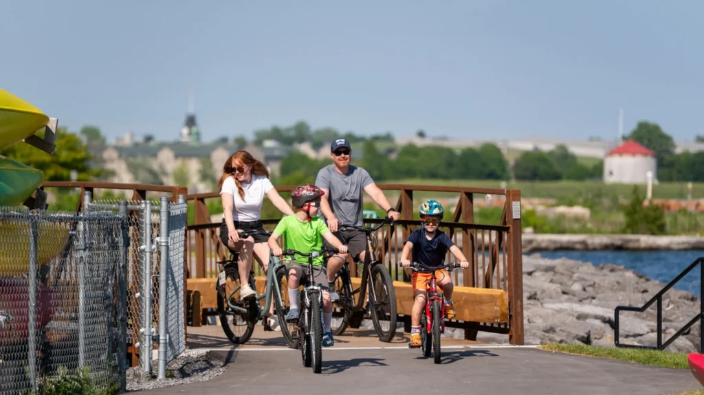 Family with bicycles on the Kingston waterfront
