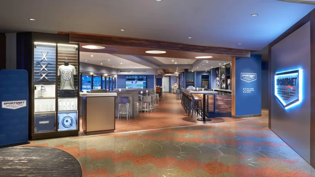 Bar and seating inside Sportsnet Grill in Toronto