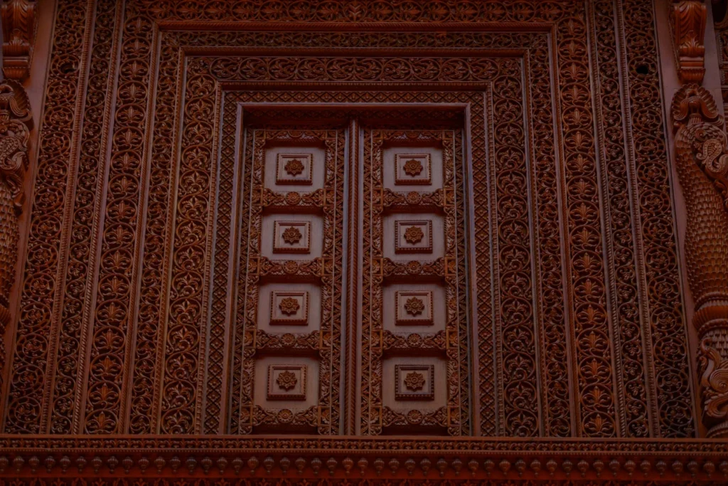 A carved wooden ceiling inside the Toronto Haveli