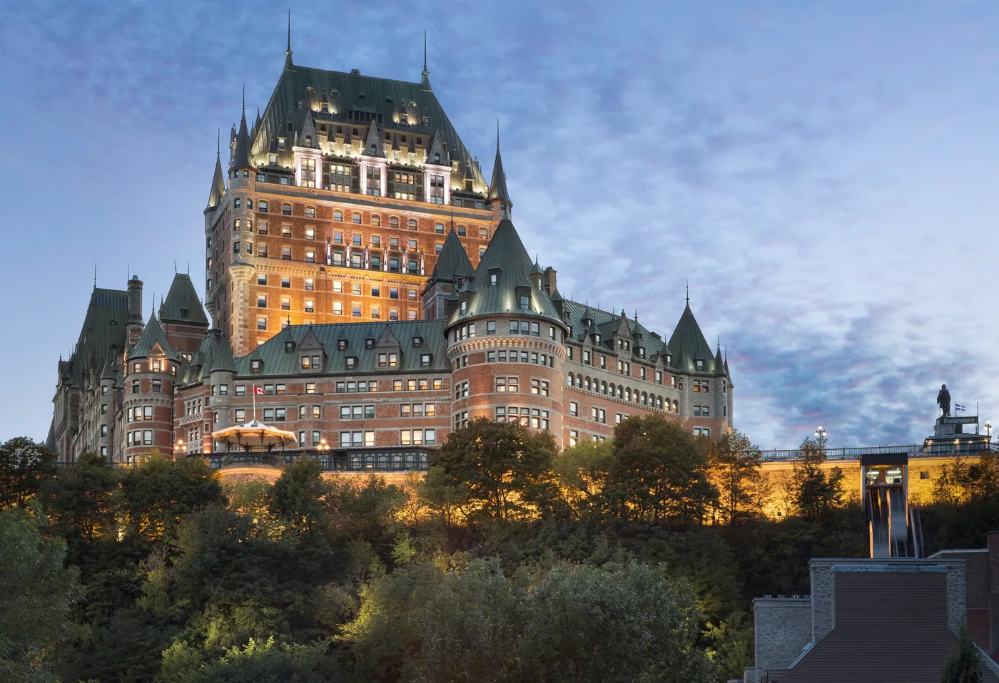 Chateau Frontenac rising above the trees and buildings of Old Quebec