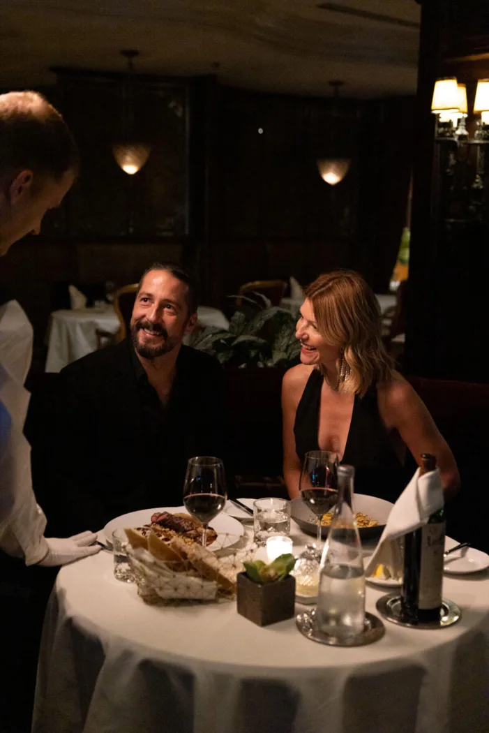 Two guests dining by candlelight in Bacchus at the Wedgewood Hotel