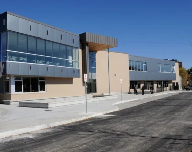The glass and brick exterior of Edithvale Community Centre on a sunny day.