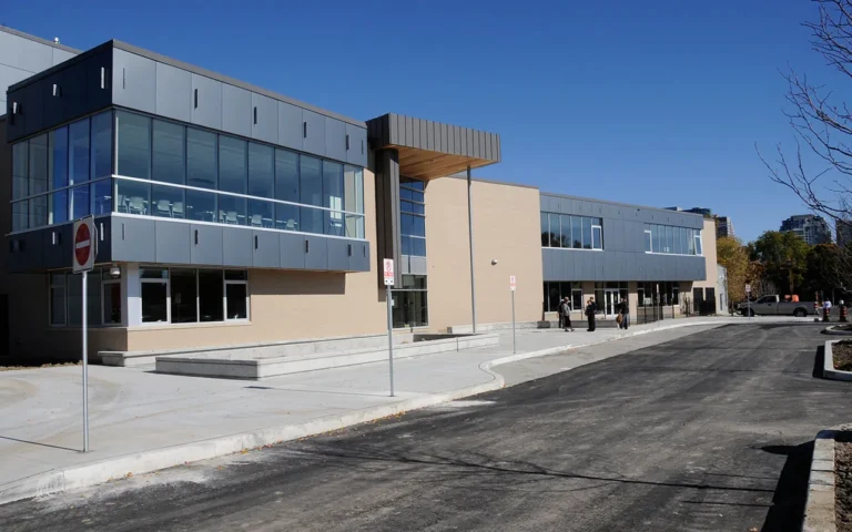 The glass and brick exterior of Edithvale Community Centre on a sunny day.