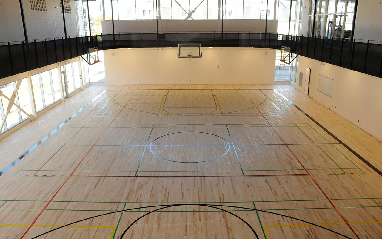 Basketball hoops and court markings in Edithvale’s indoor gym.