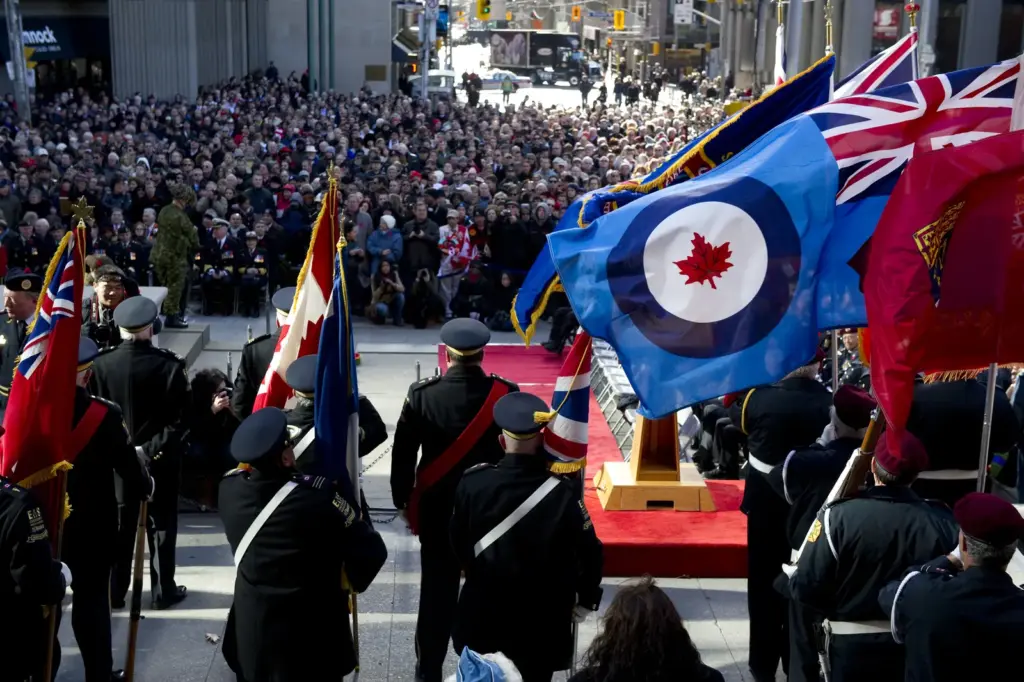 Crowd gathered for a Remembrance Day service at Old City Hall in Toronto