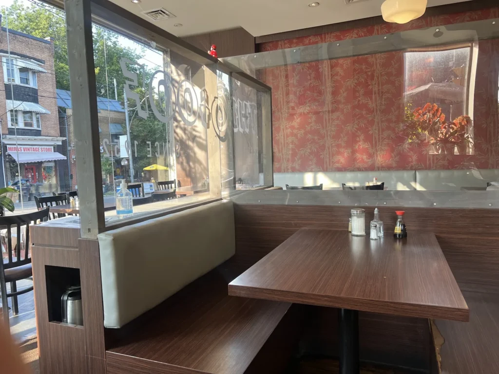 A window booth inside Garden Gate Restaurant