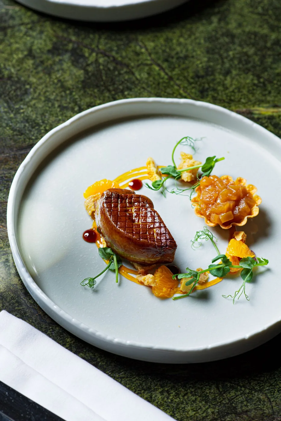 A carefully plated dish at the Hazelton Hotel