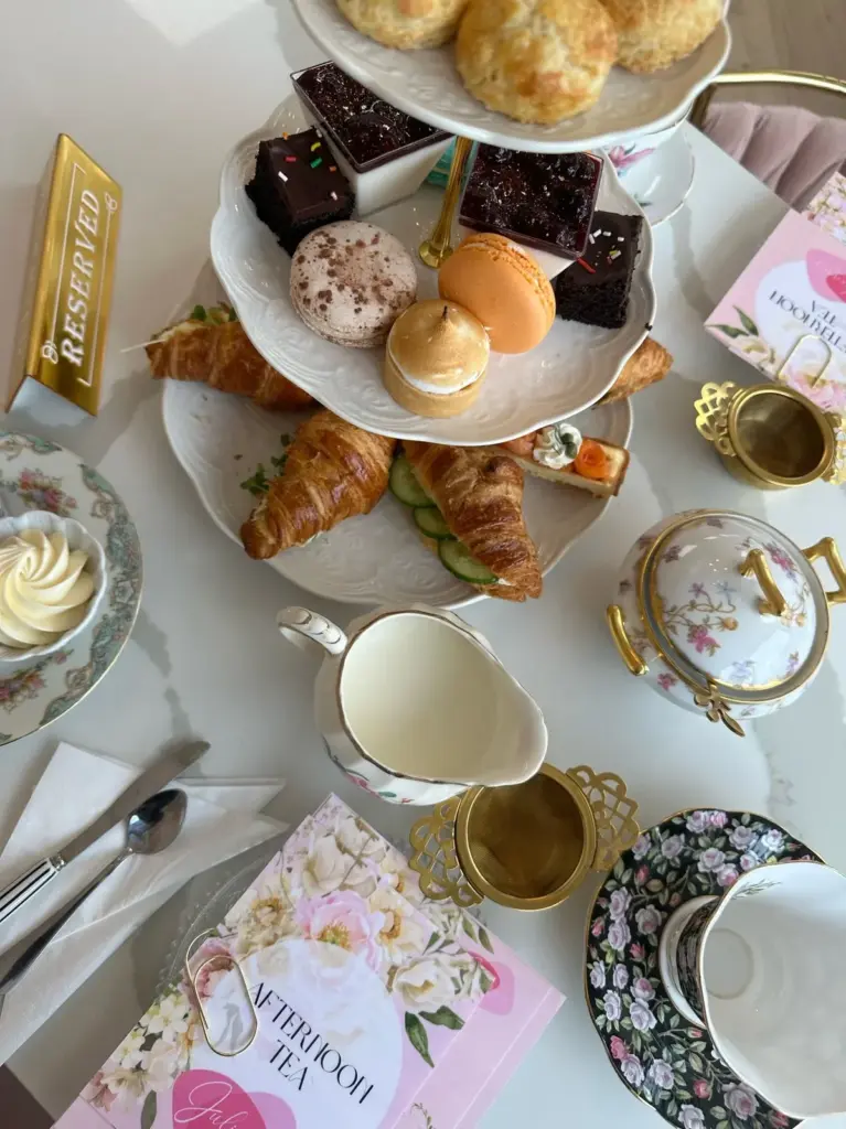 Sandwiches, scones and pastries arranged on a table at Julienne's Patisserie