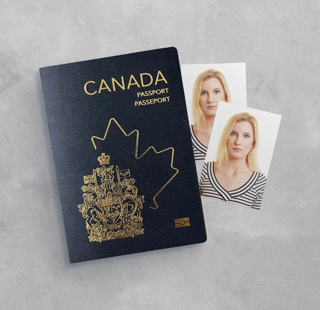 A Canadian passport and two printed photographs of a woman on a grey surface