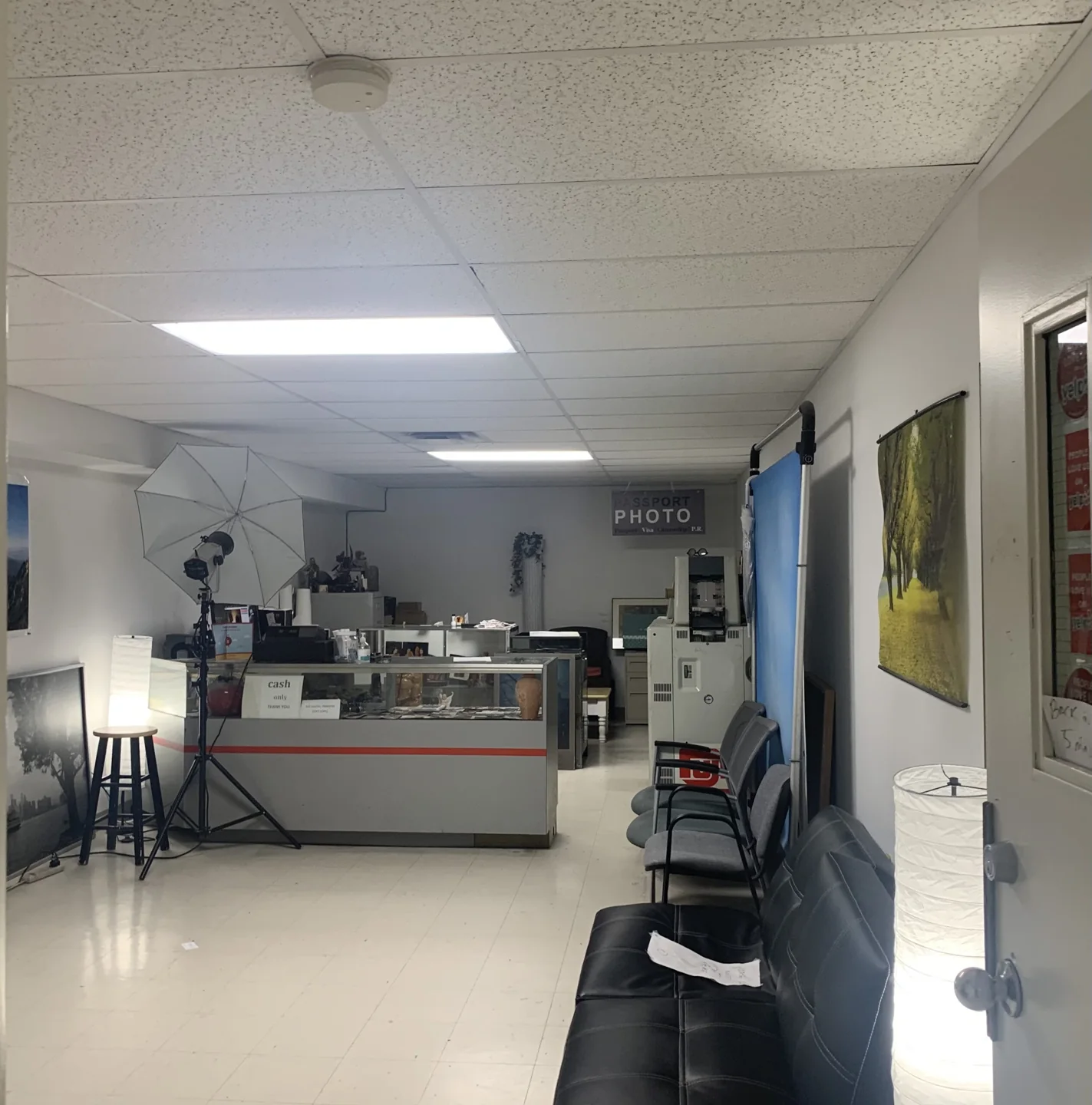 The interior of the Passport Photo shop listed by Chinatown BIA