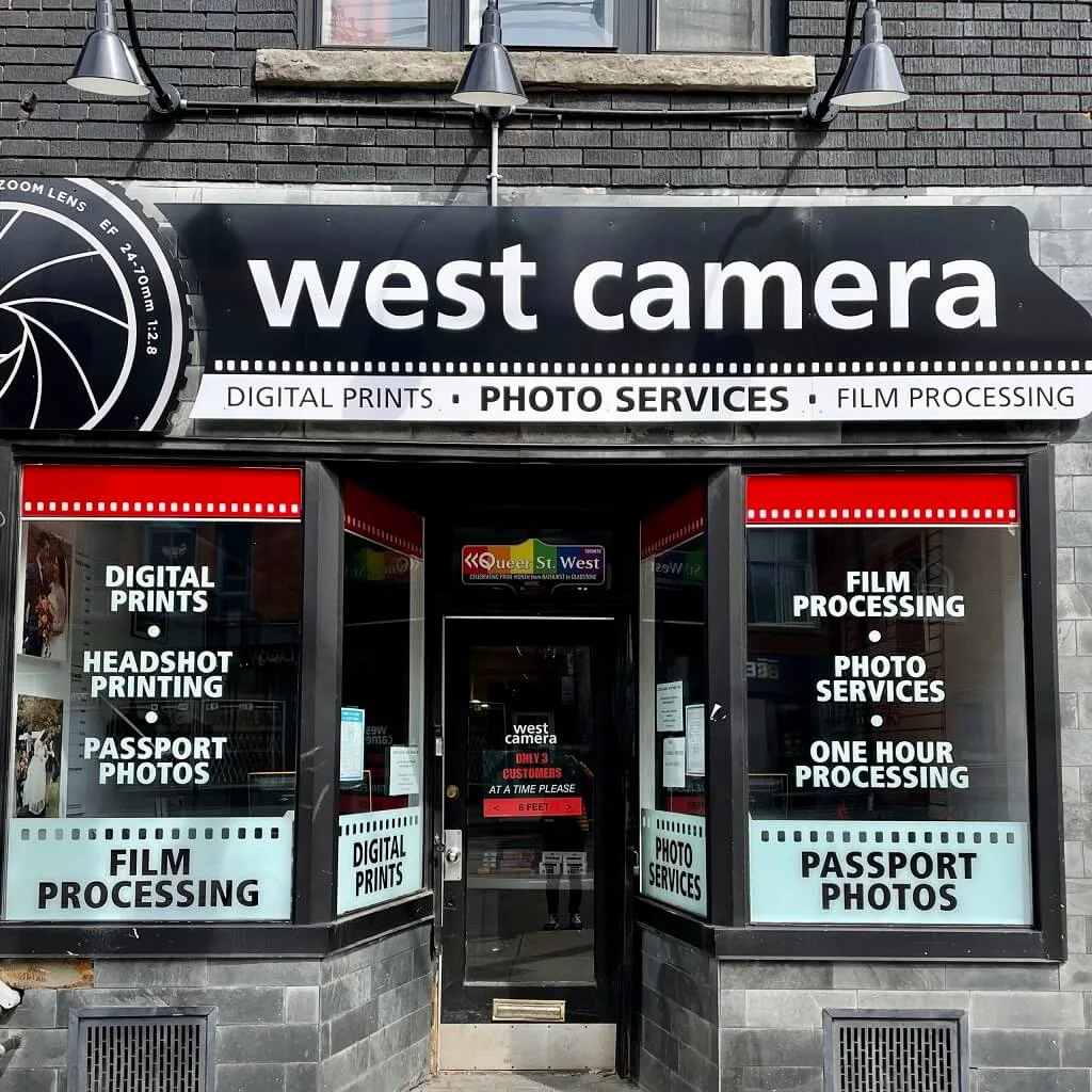 The West Camera shopfront with its door open on Queen Street West