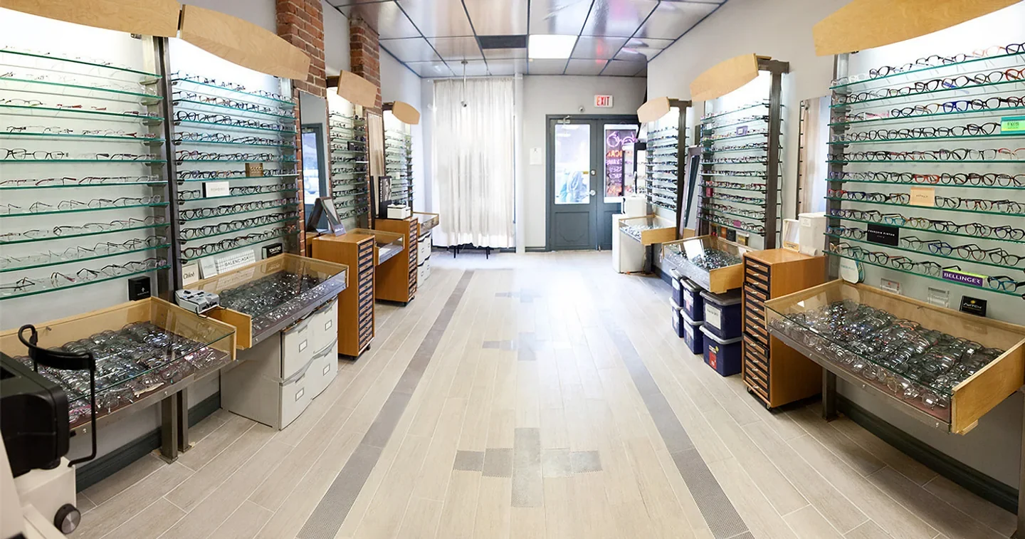 Walls and counters filled with frames inside The Optic Zone