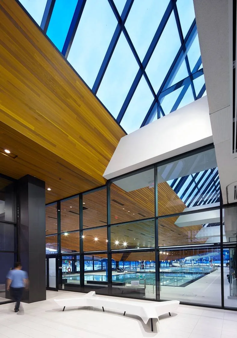 Tall windows in the entrance hall at Pam McConnell Aquatic Centre