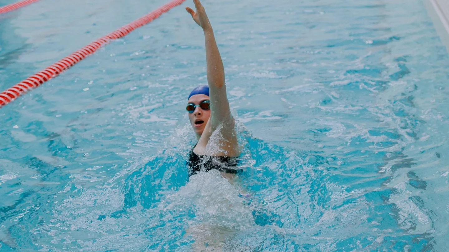 Swimmer practising a stroke at Hart House
