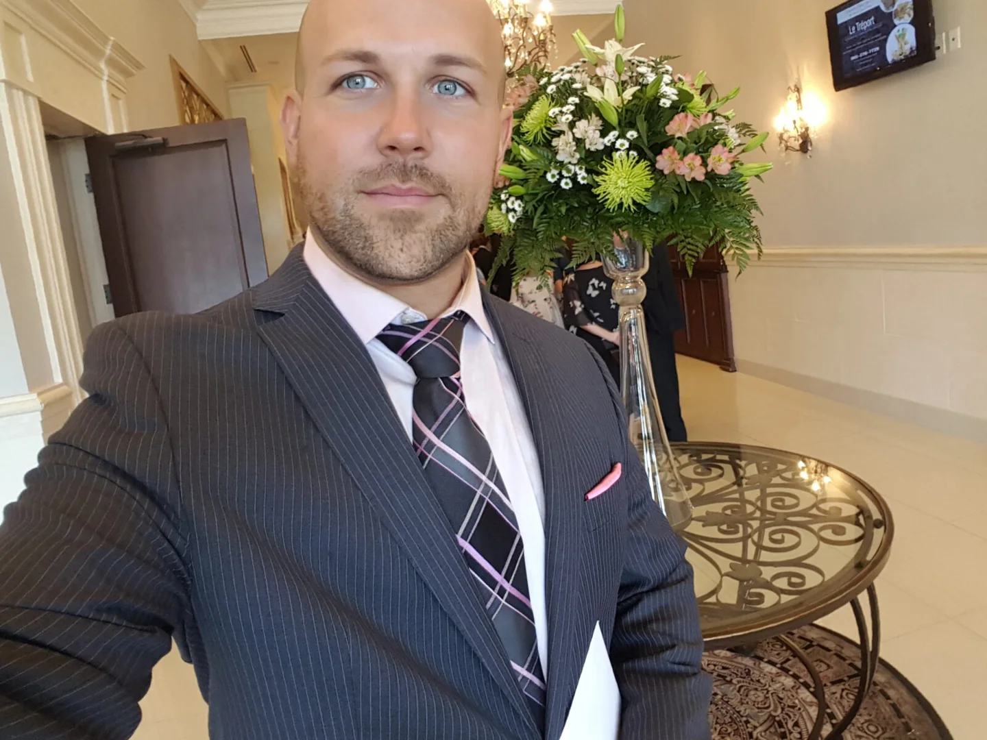 A man wearing a suit in a photograph supplied by Caruso Fine Tailoring
