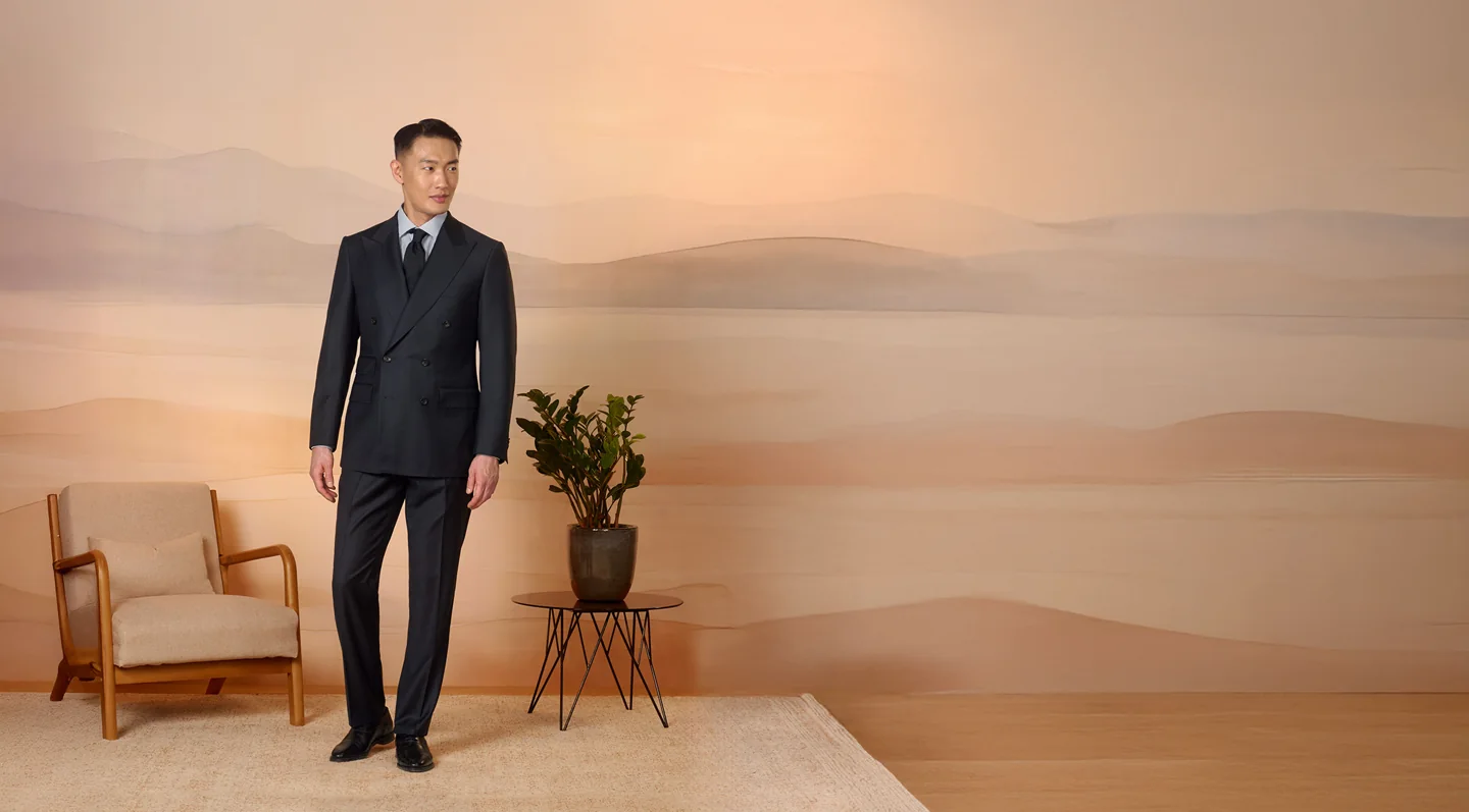 A model wearing a dark suit shown by Spier & Mackay