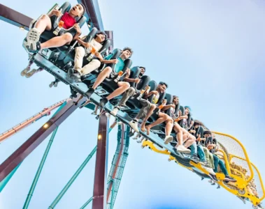 Riders on an inverted roller coaster at Canada’s Wonderland