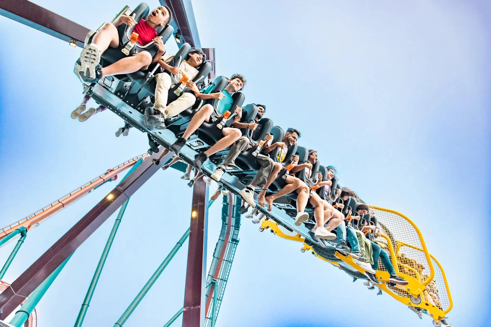 Riders on an inverted roller coaster at Canada’s Wonderland