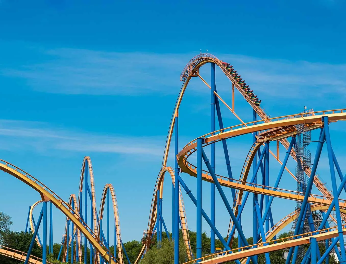 Roller coaster tracks against a blue sky at Canada’s Wonderland