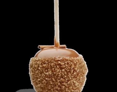 A caramel apple rolled in chopped nuts