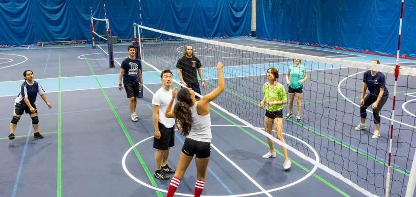 Players in a University of Toronto indoor volleyball session