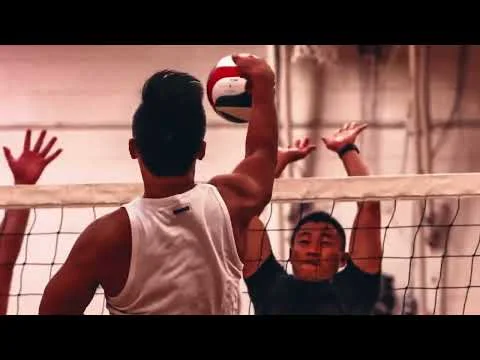 Players contesting a ball at an XTSC volleyball net