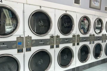 Stacked dryers inside Washworld Coin Laundry
