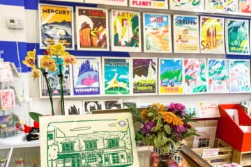 Art prints and cards displayed at Secret Planet