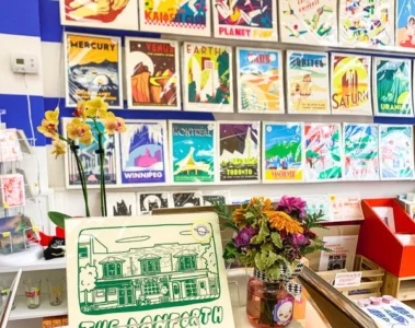 Art prints and cards displayed at Secret Planet