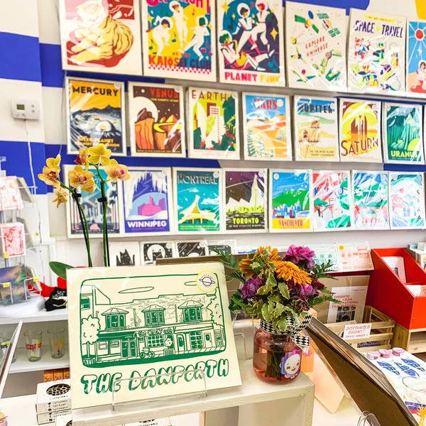 Art prints and cards displayed at Secret Planet