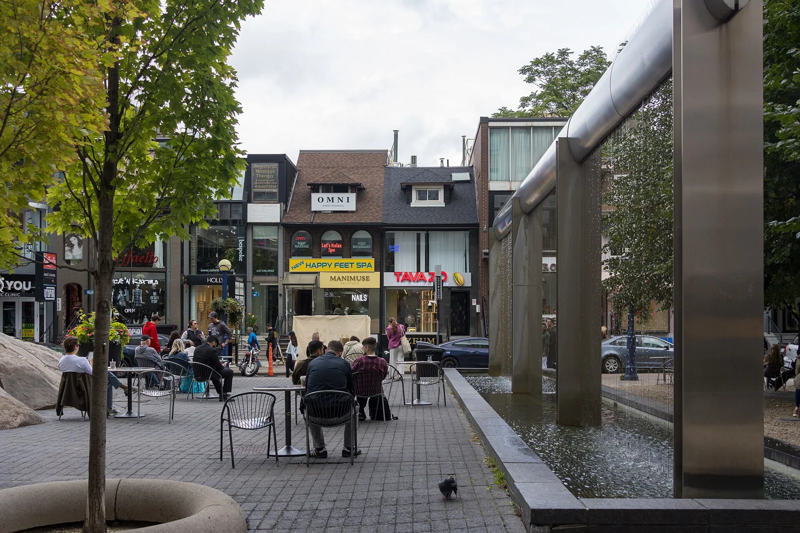 People sitting near shops in Yorkville in September 2026