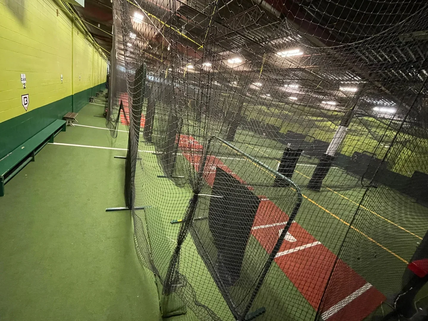 Indoor netted batting cages at Baseline Sports