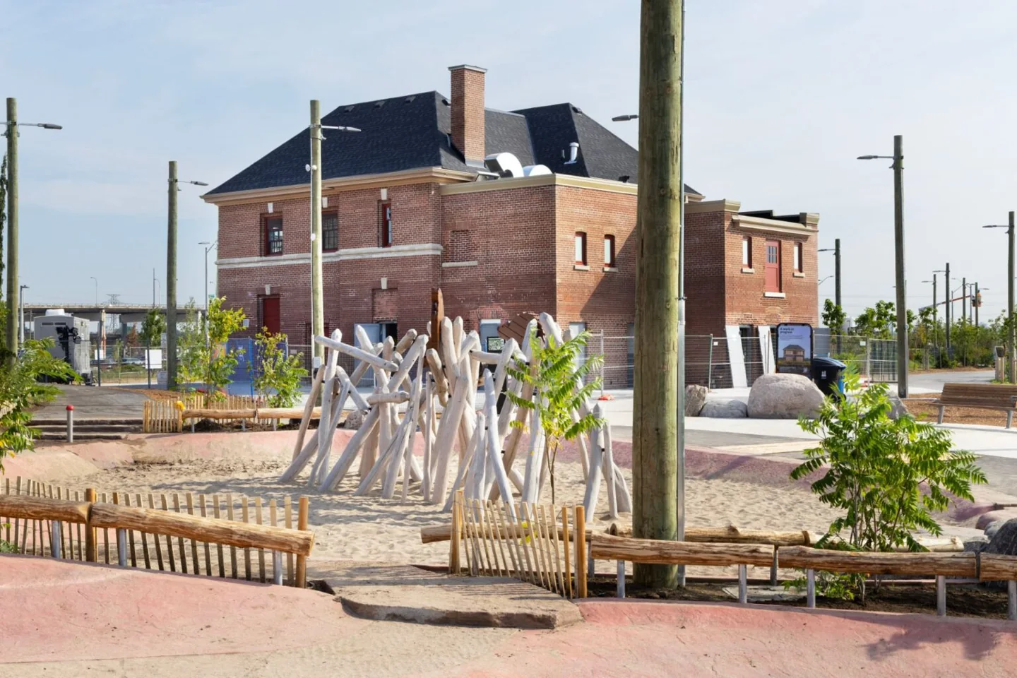 The rear of the restored fire hall beside the park’s play areas