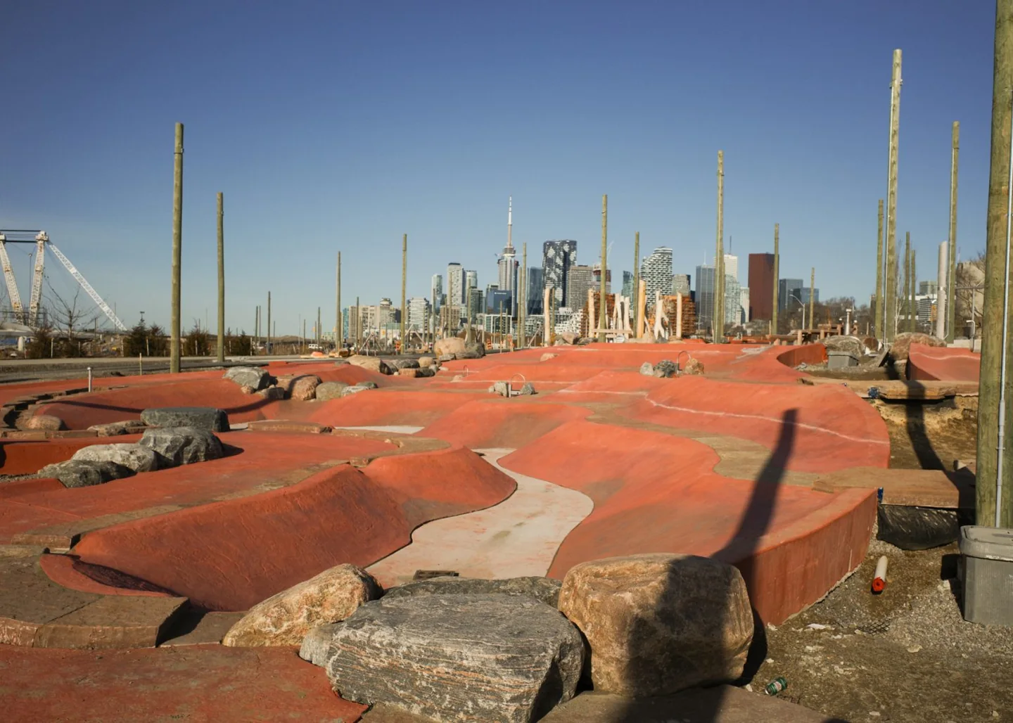 Red sculpted play surfaces at the Badlands Scramble