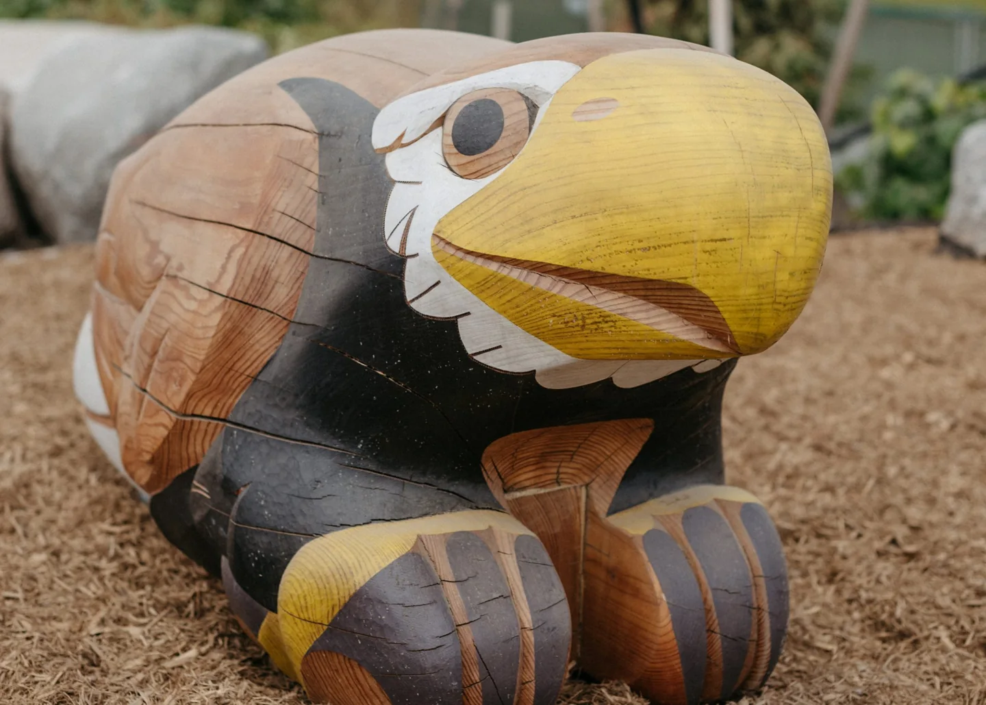 A large carved wooden eagle at Biidaasige Park
