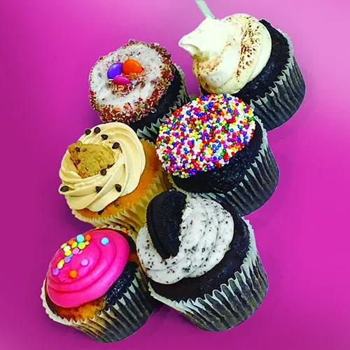 Six cupcakes with different icing flavours from The Cupcake Shoppe