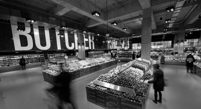 A black-and-white photograph inside Loblaws at Maple Leaf Gardens
