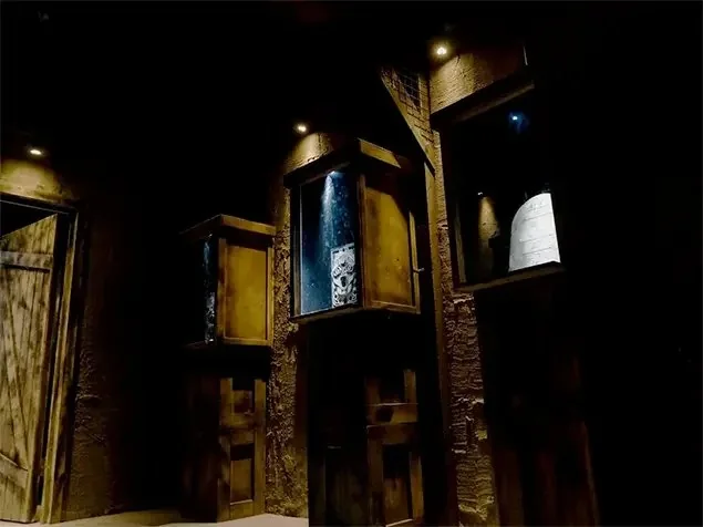 A carved stone-style doorway inside Crypto’s Cursed Temple