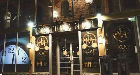 Escape Manor’s lit storefront on King Street West