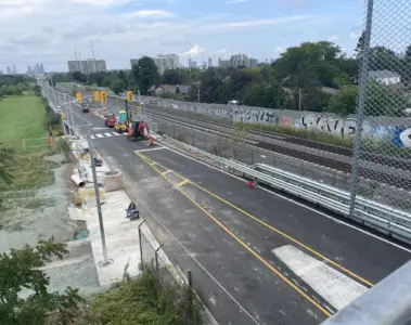 New platforms and painted bus lanes near Tara Avenue during August 2026 construction