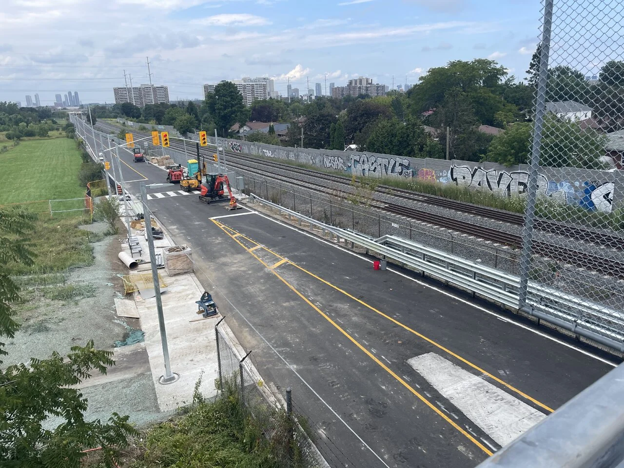 New platforms and painted bus lanes near Tara Avenue during August 2026 construction