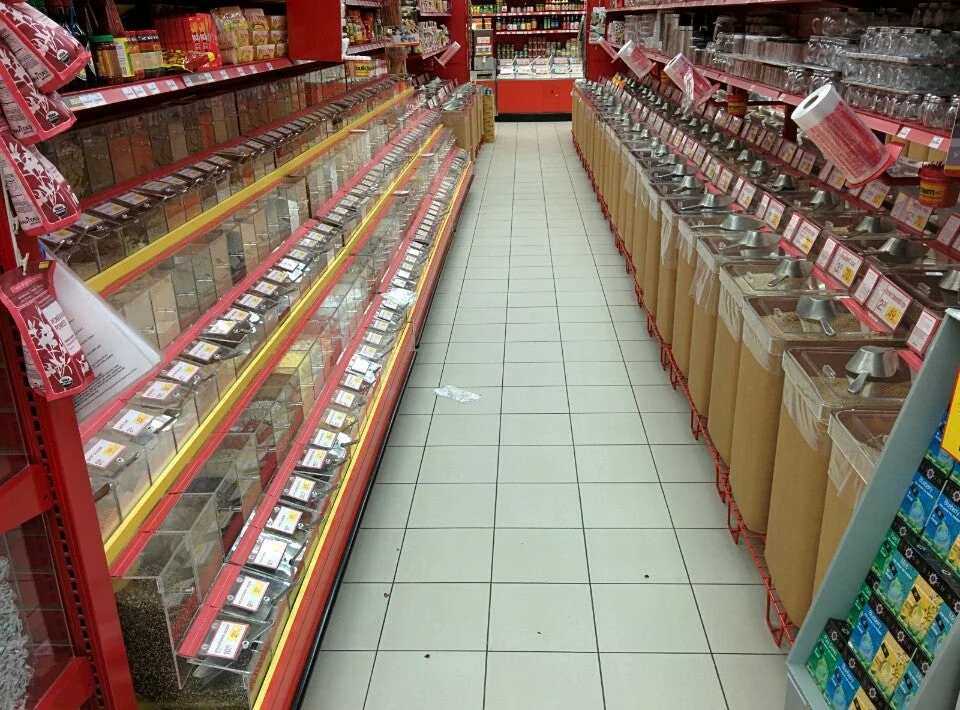 Bulk food bins and scoops in a Toronto Bulk Barn store