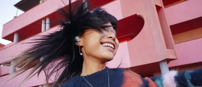 A person listening to music with headphones