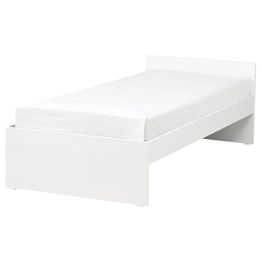 A simple white single bed frame